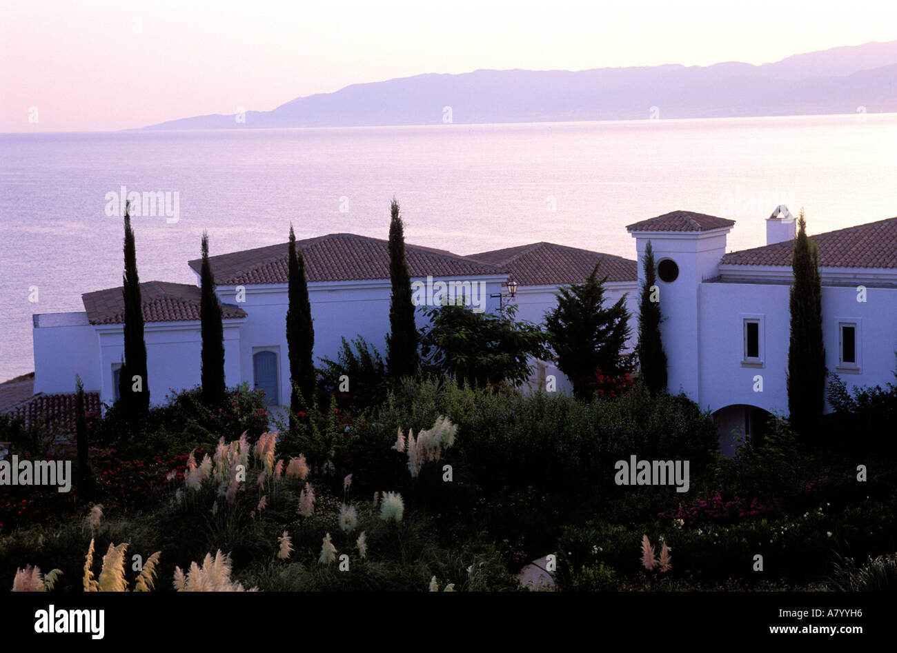 Cyprus, Pafos District, Akamas Peninsula, Lakki town, Anassa Hotel, jet set home, villas in a garden on the seaside Stock Photo