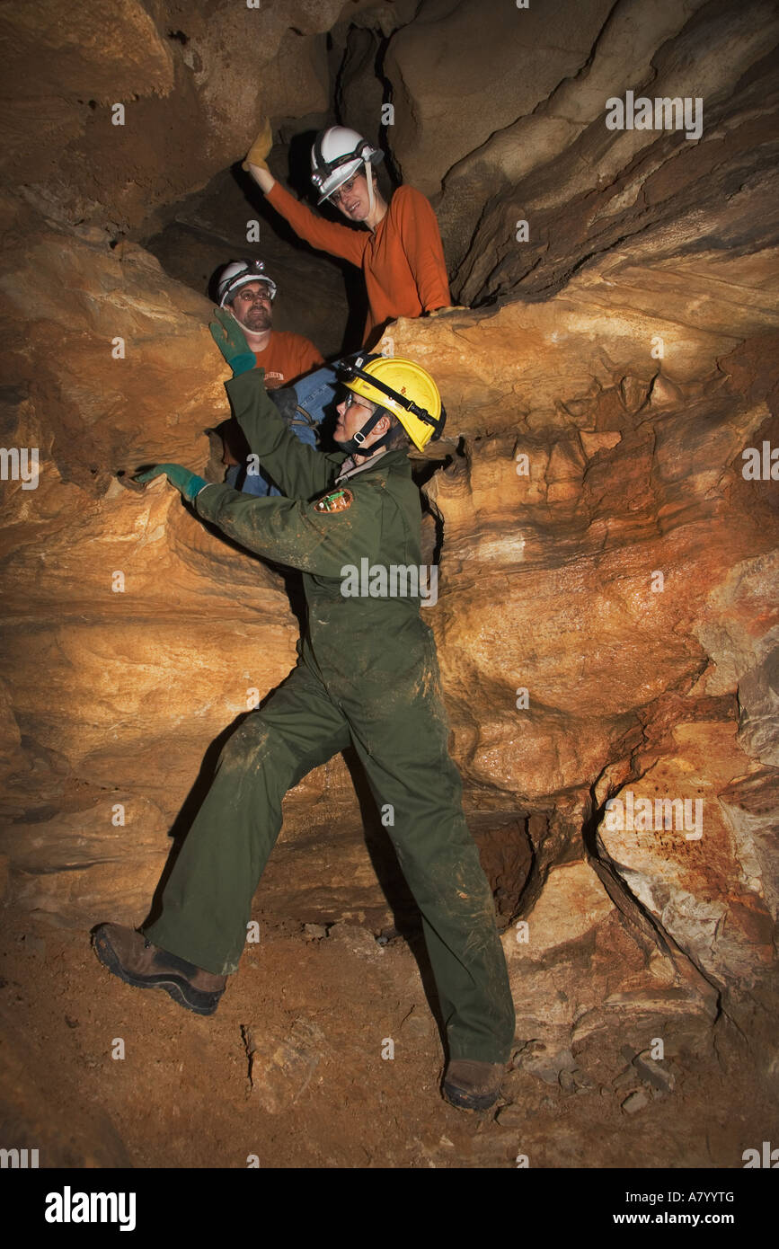 Park Ranger and visitors climbing during wild cave tour, Mammoth Cave