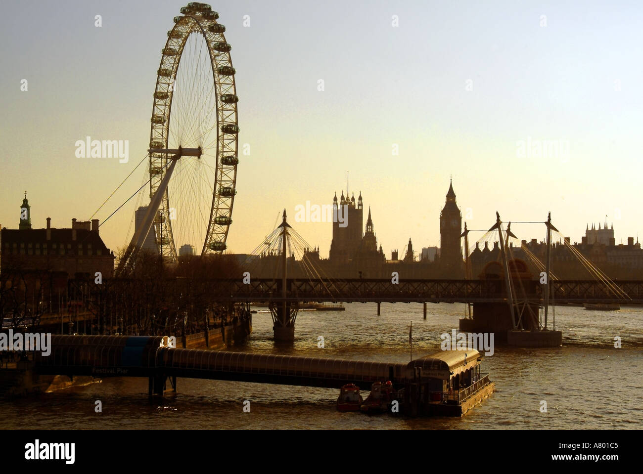 england london river thames the london eye and the south bank complex houses of parliament in distance Stock Photo