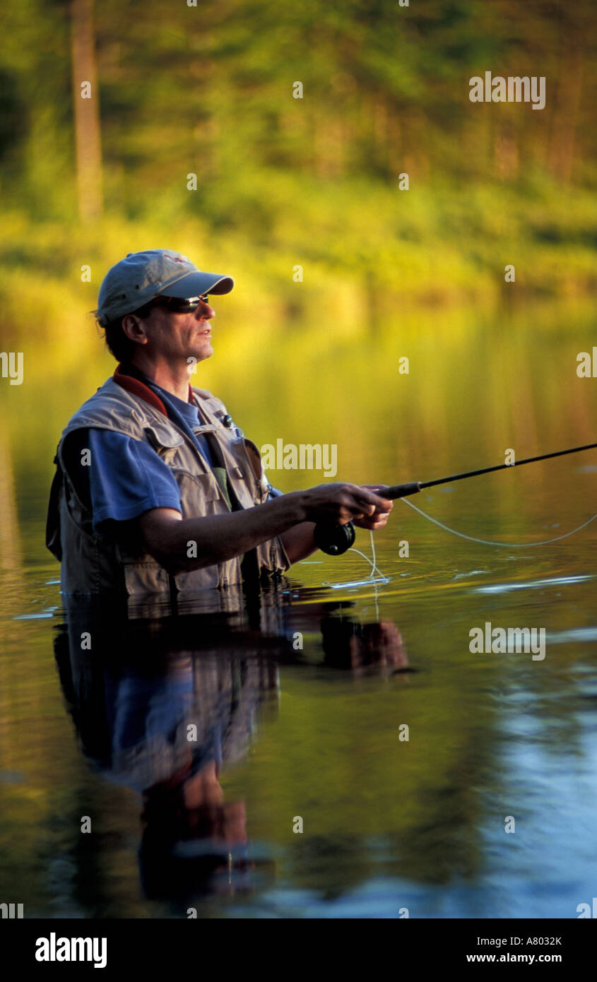 Freedom, NH. Fly-fishing in Trout Pond in New Hampshire's Lakes Region. Hip  waders. Part of future town forest. (MR Stock Photo - Alamy