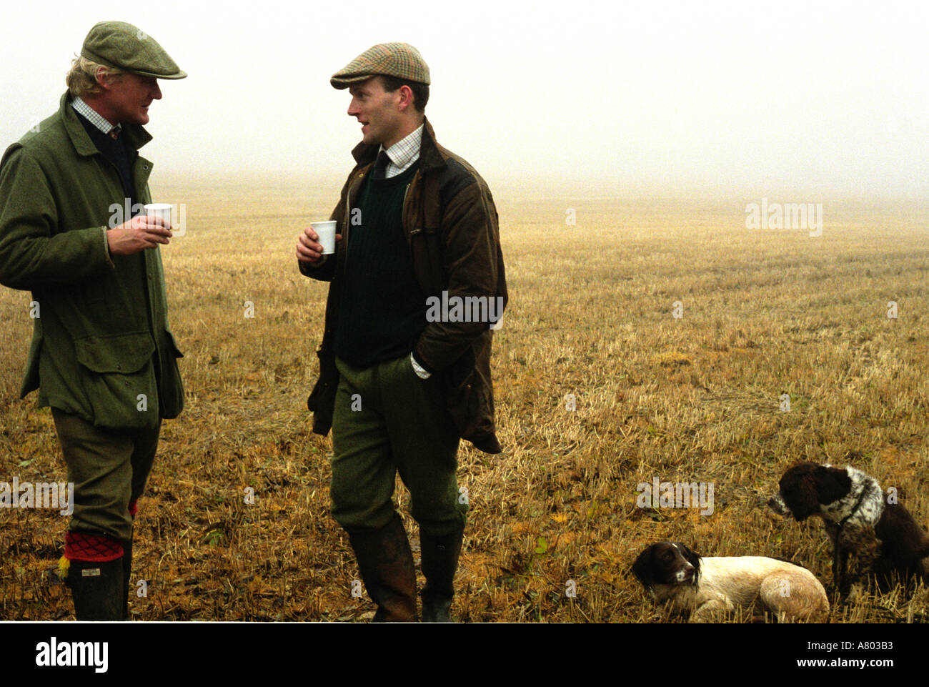 Two gentlemen chatting on a pheasant shoot Stock Photo