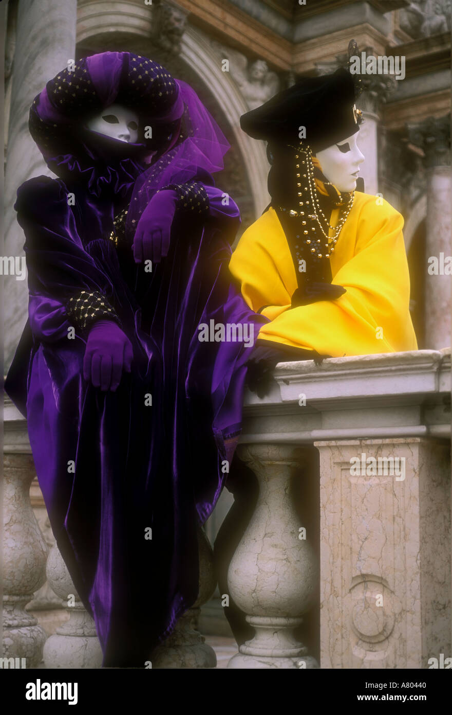 Two masked carnival revellers in St Marks Square Venice Italy Stock ...