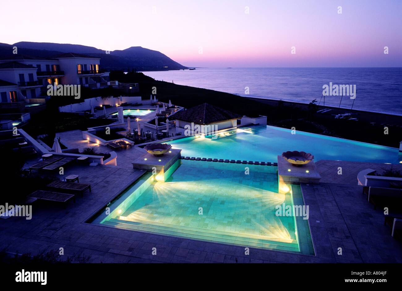 Cyprus, Pafos District, Akamas Peninsula, Anassa Hotel with its swimming pool in front of the sea Stock Photo