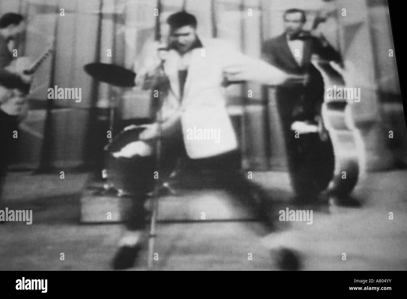 USA, Tennessee, Nashville: Country Music Hall of Fame, Video of 1950's Elvis Presley Performance Stock Photo