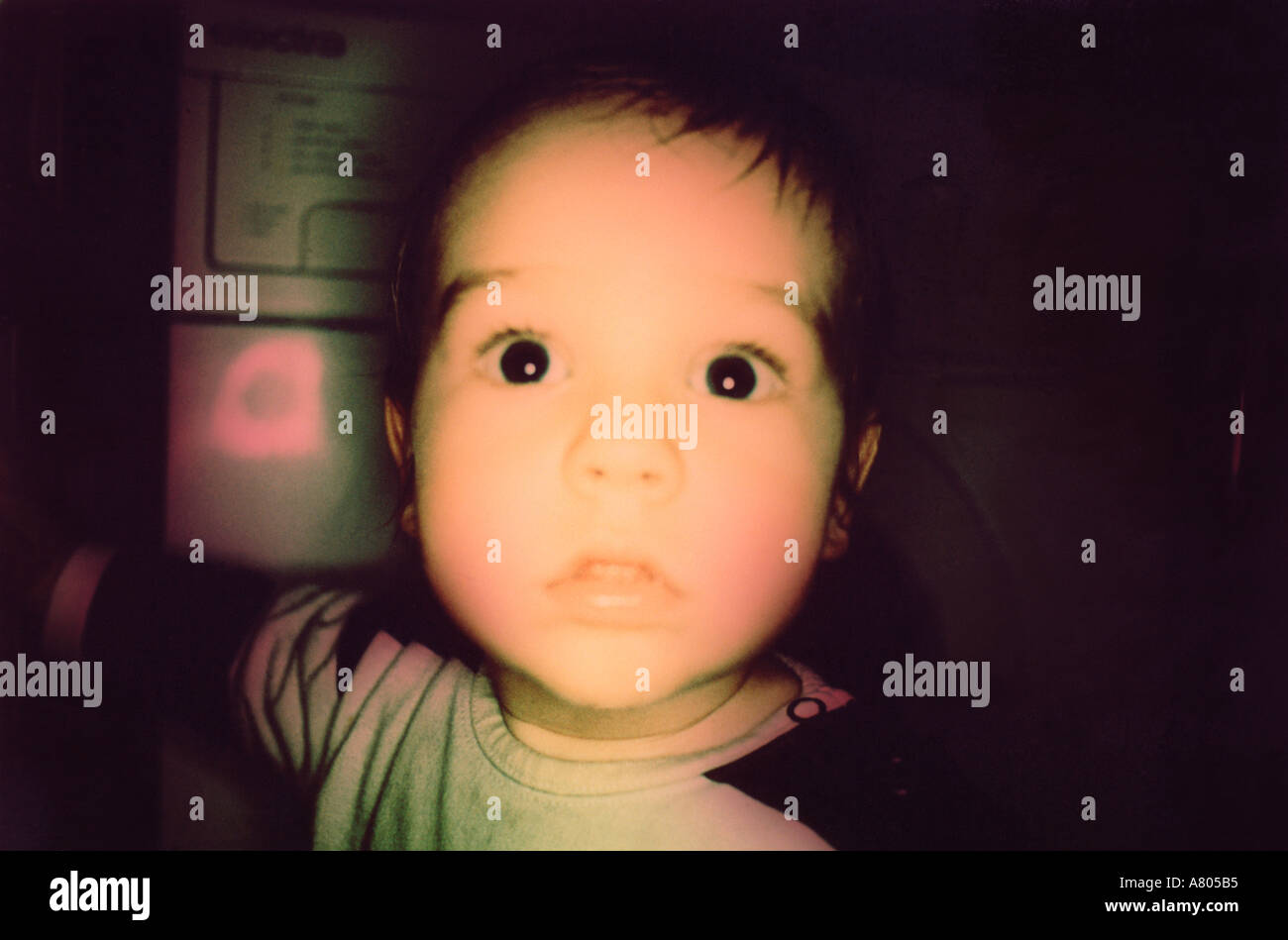 Home alone toddler looking scared Stock Photo Alamy