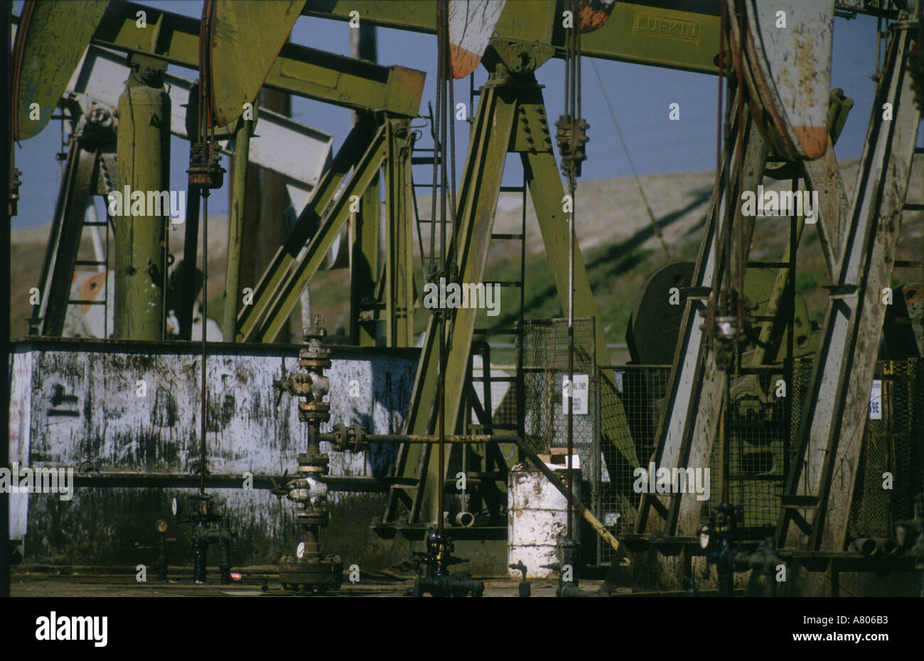 A row of pump jack in Los Angeles Stock Photo Alamy