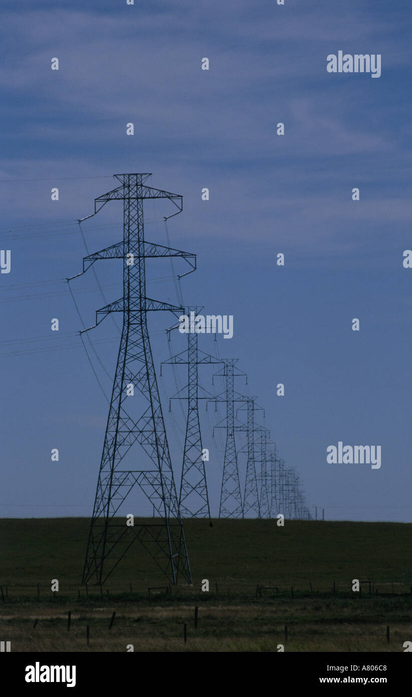 Electrical power lines with a blue sky Stock Photo - Alamy