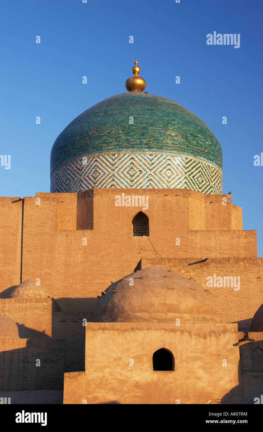 Khiva, Pahlavon Mohammed Mausoleum In Morning Sunshine Stock Photo