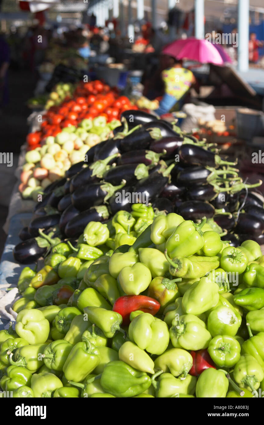 Green Peppers And Aubergines At Market Stock Photo - Alamy