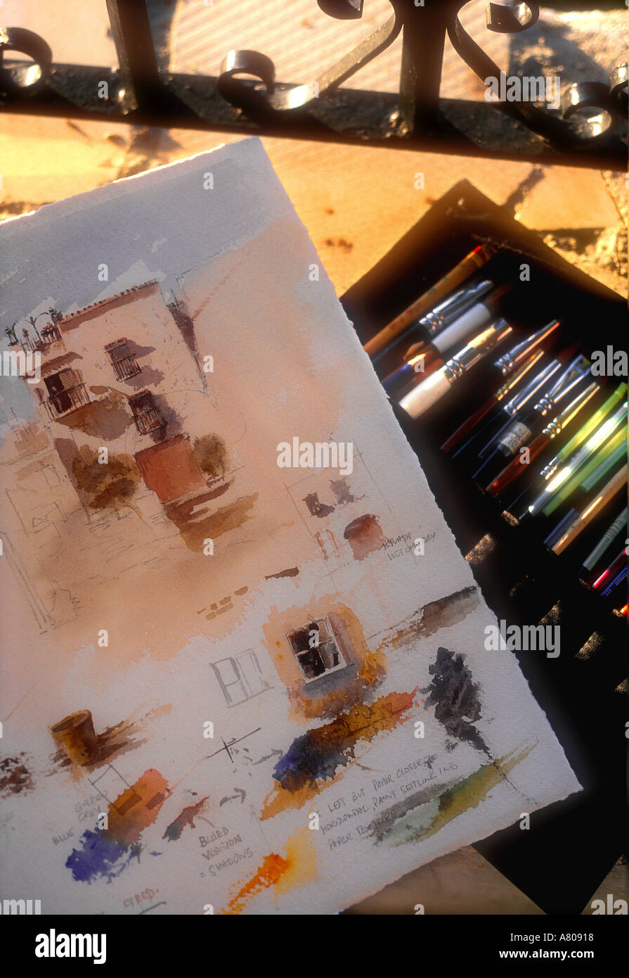 Detail of watercolour painting with brushes and pencils Zuheros Andalucia Spain Stock Photo
