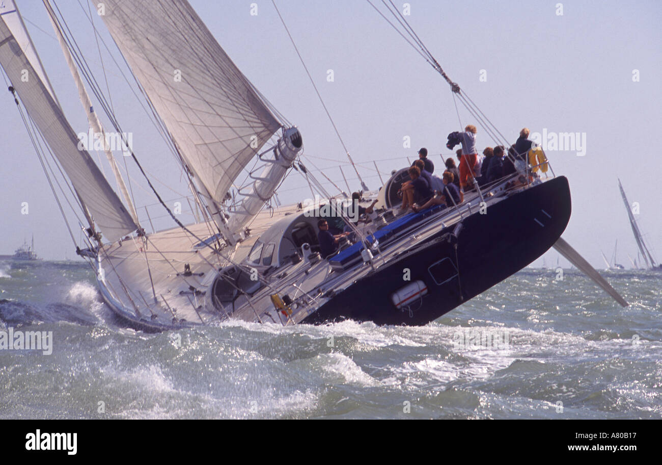 A yacht racing to windward in The Solent near Cowes Isle of Wight England Great Britain Stock Photo