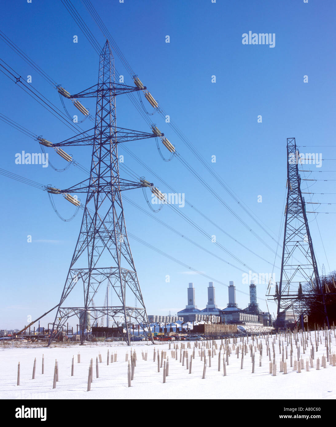 Electricity pylons in winter UK Stock Photo - Alamy