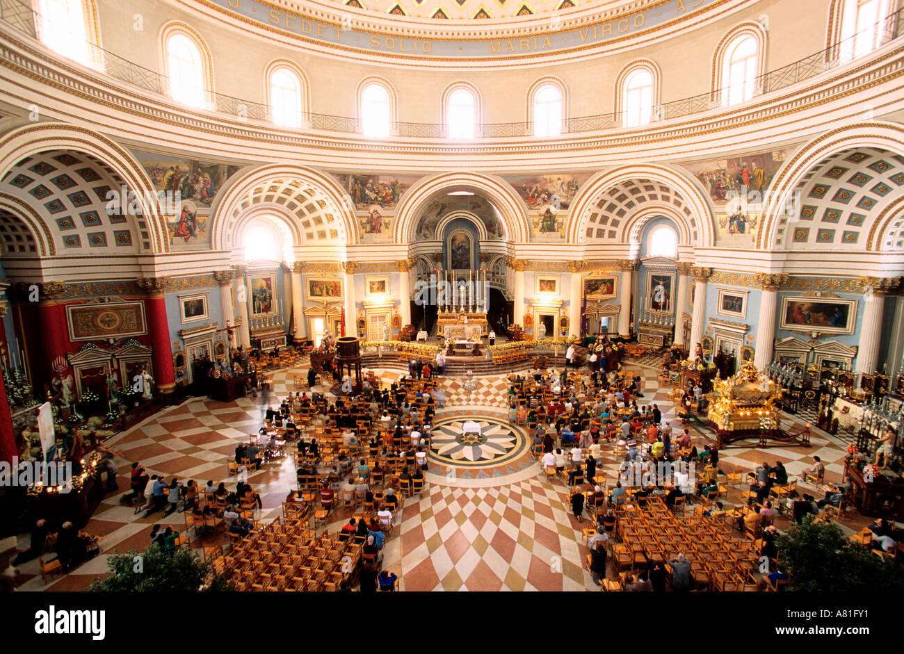 Malta, mass in the church Saint Mary of Mosta inspired by the Pantheon of Rome, Stock Photo