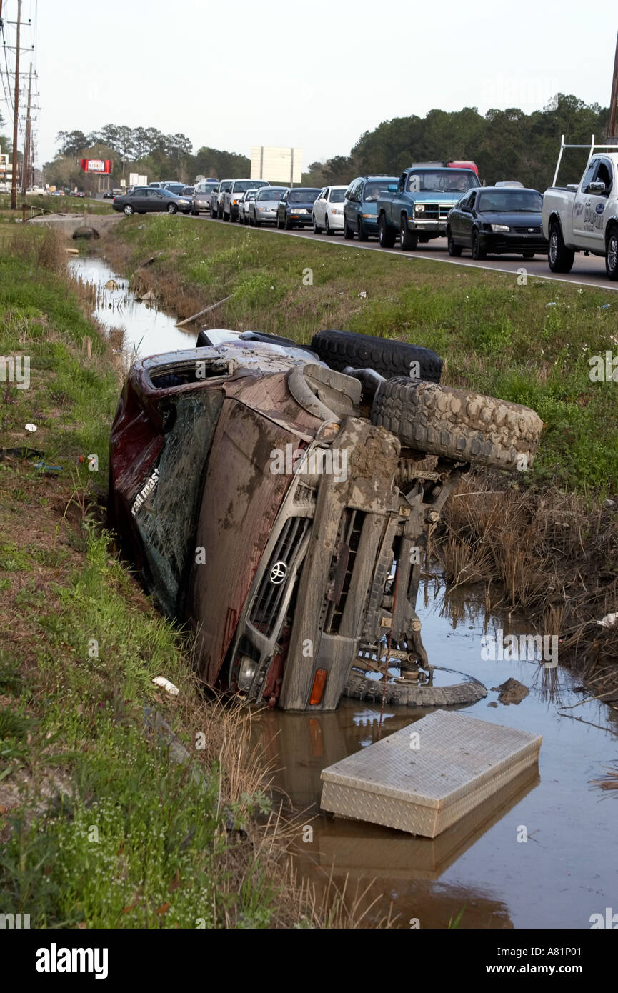 An overturned truck in a ditch Stock Photo - Alamy
