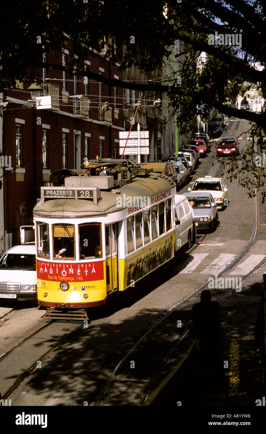 Portugal, Lisbon, tramway number 28 crosses the Alfama district Stock Photo