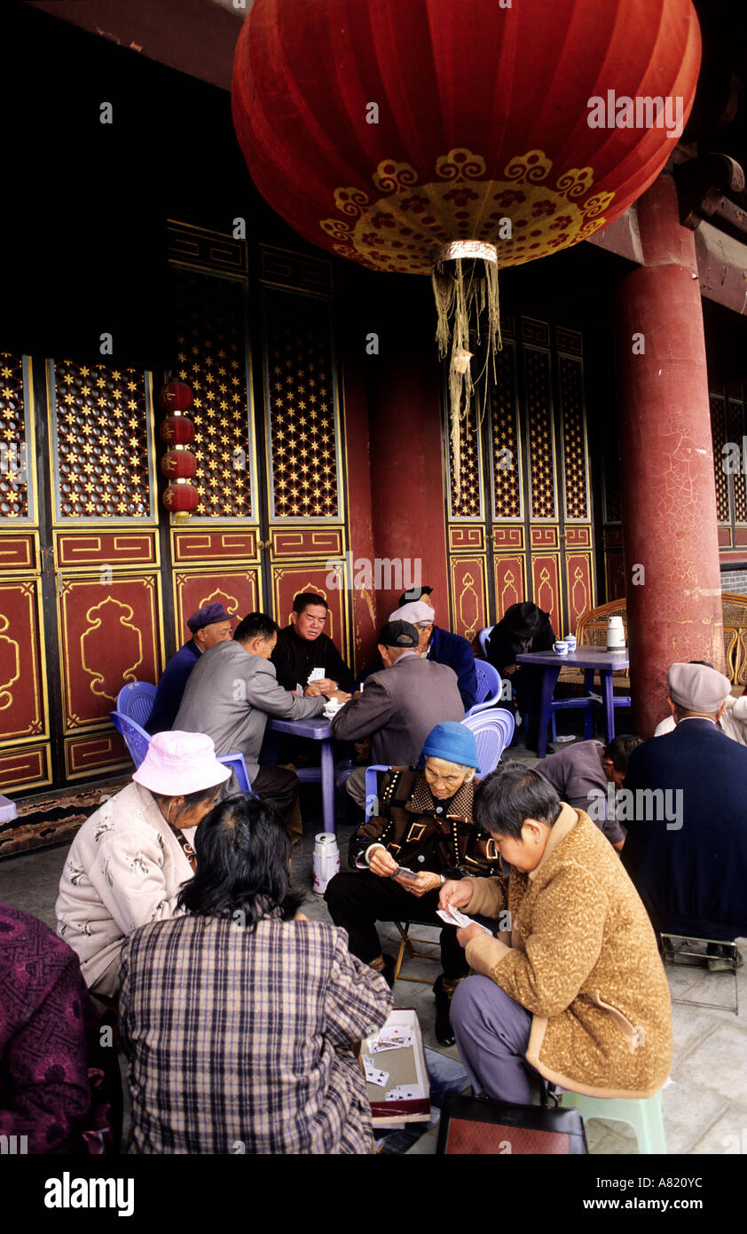 China, Yunnan province, Jianshui city, cards players Stock Photo