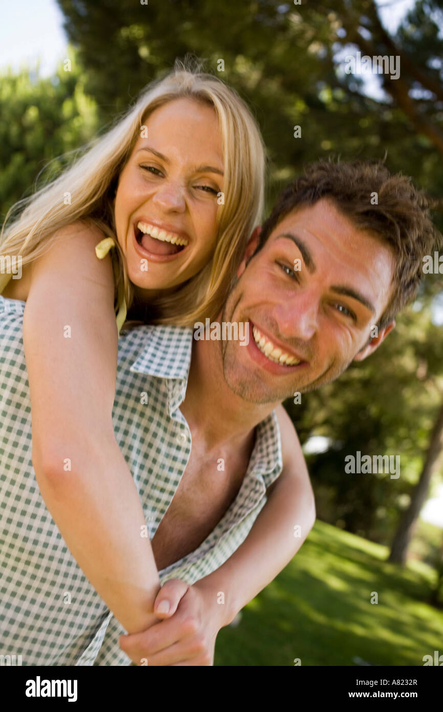 Couple playing piggyback ride in hi-res stock photography and images ...