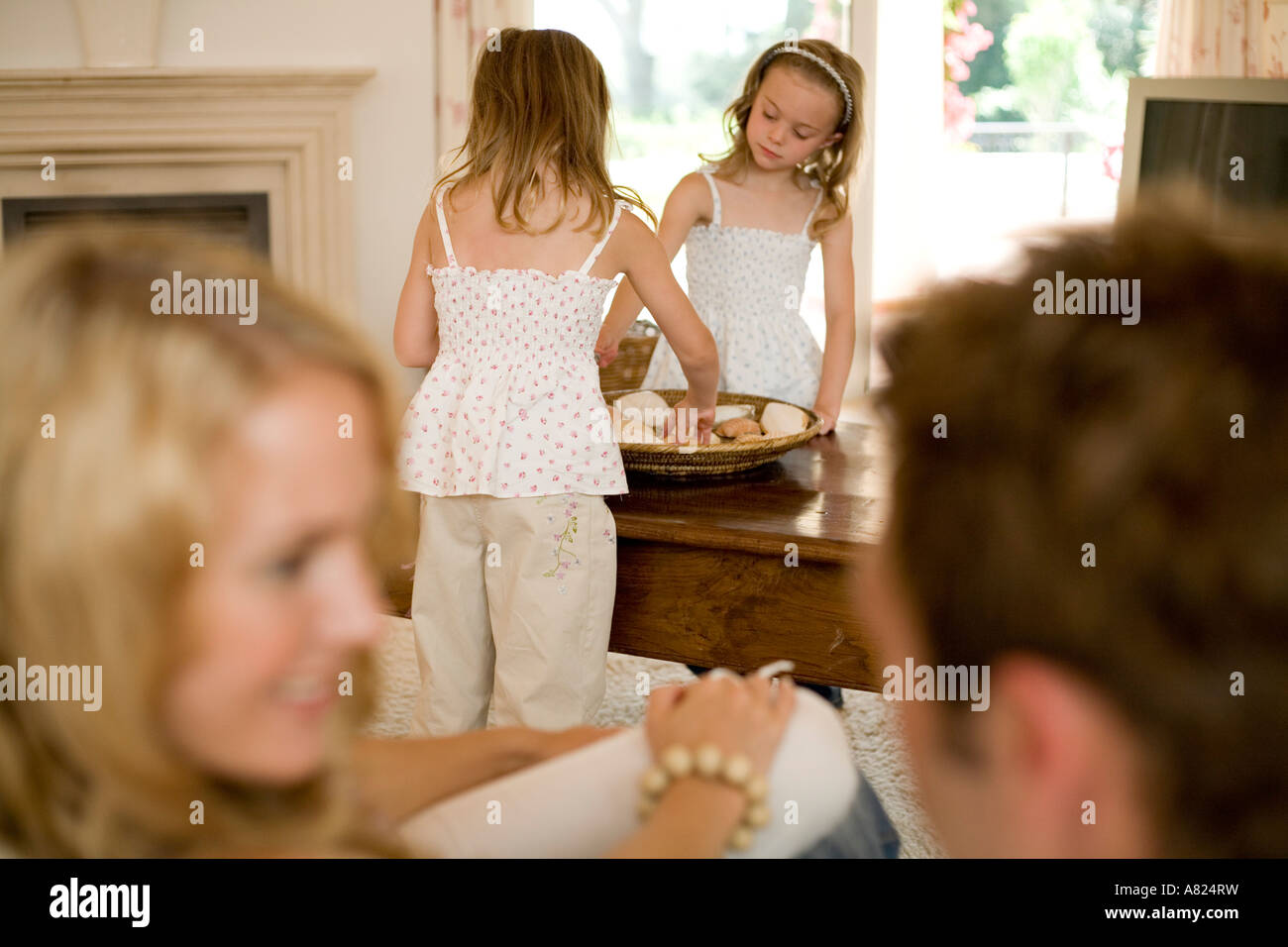 A family relaxing at home Stock Photo