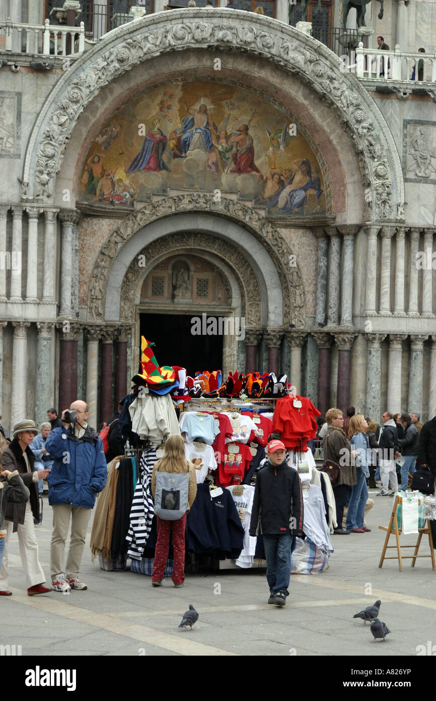 Souvenir stall in front of entrance to St Marks Cathedral, Venice, Italy Stock Photo
