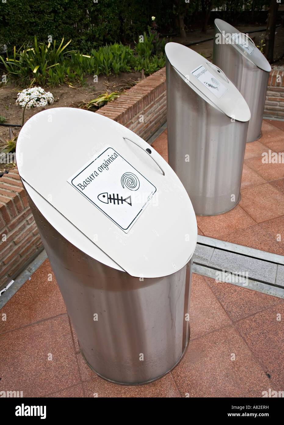 Recycling bins for organic waste that empty into underground containers