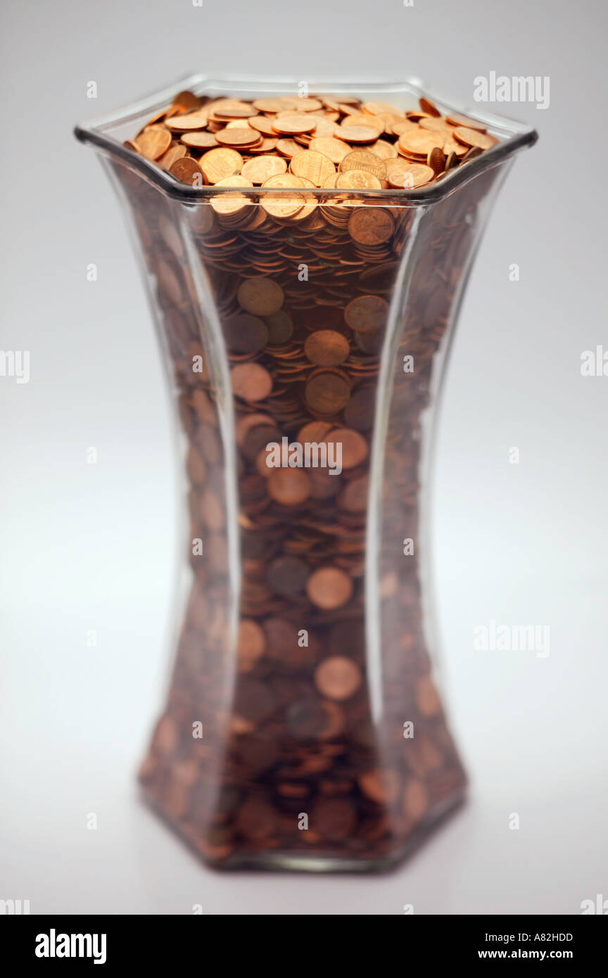 Vase full of 1 US coins Stock Photo