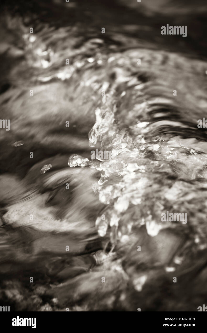 clear water flowing over rocks in a river Stock Photo - Alamy