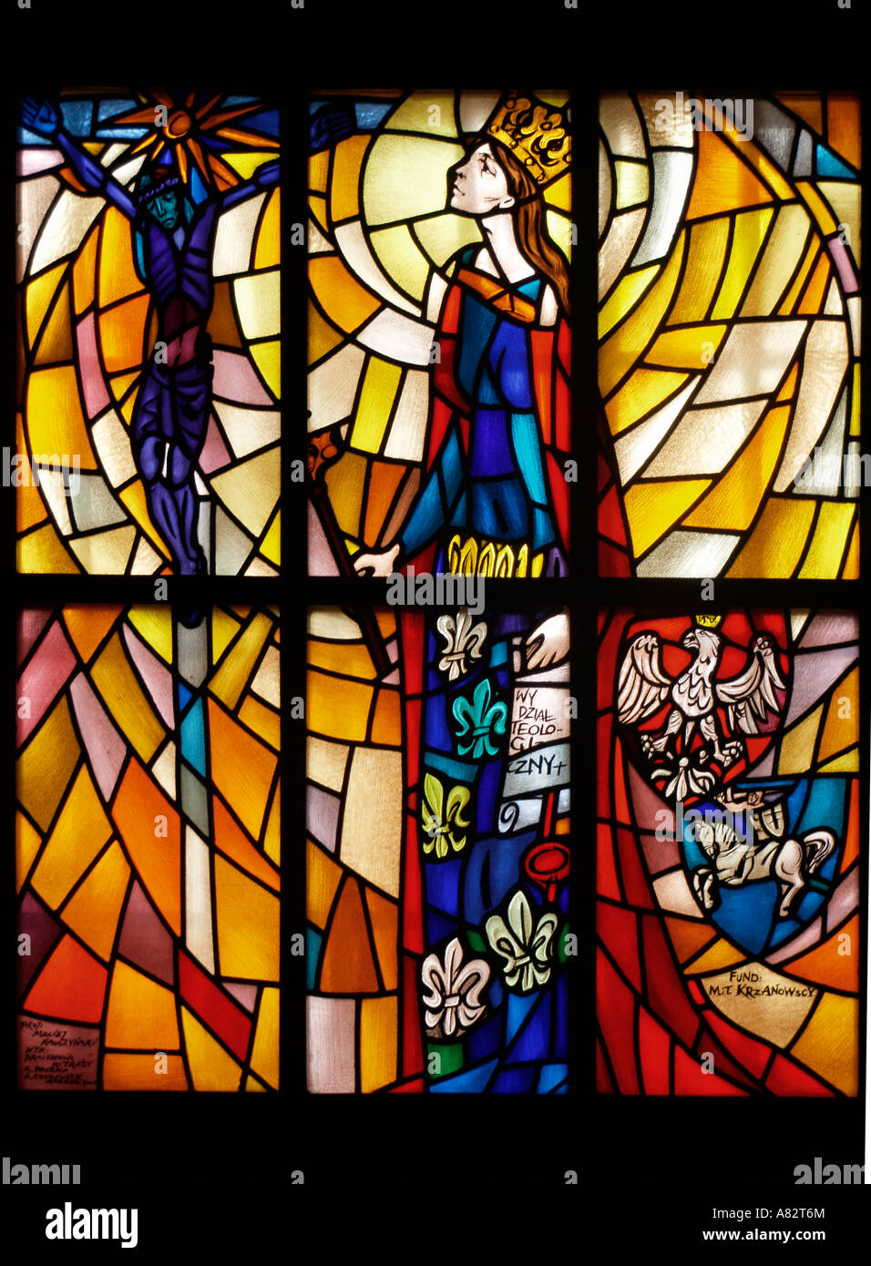 Stained glass window of Crucifix of Jesus Christ and St Mary in