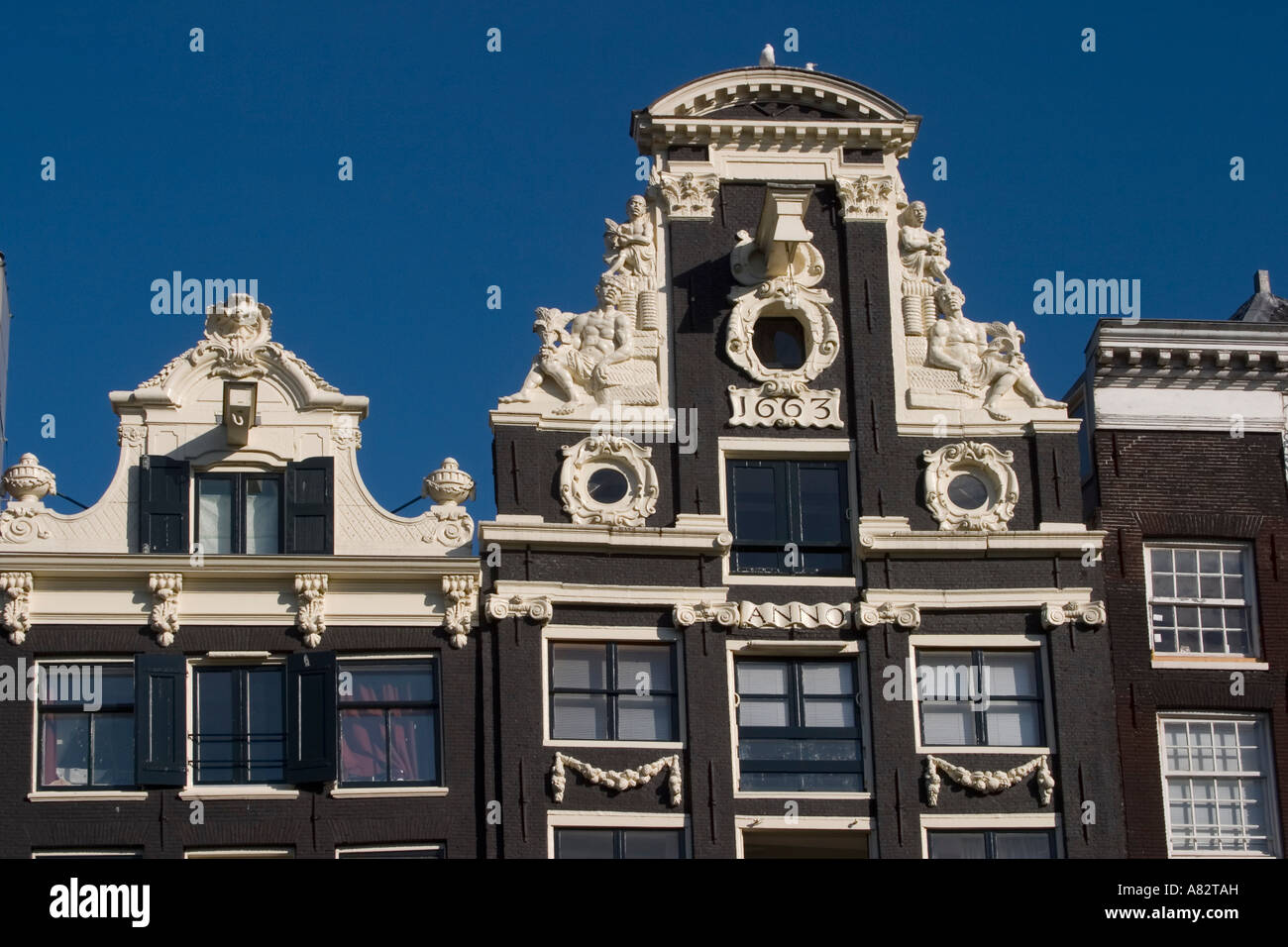 Amsterdam Jourdan district typical architecture canal house pediment with lifting block Stock Photo