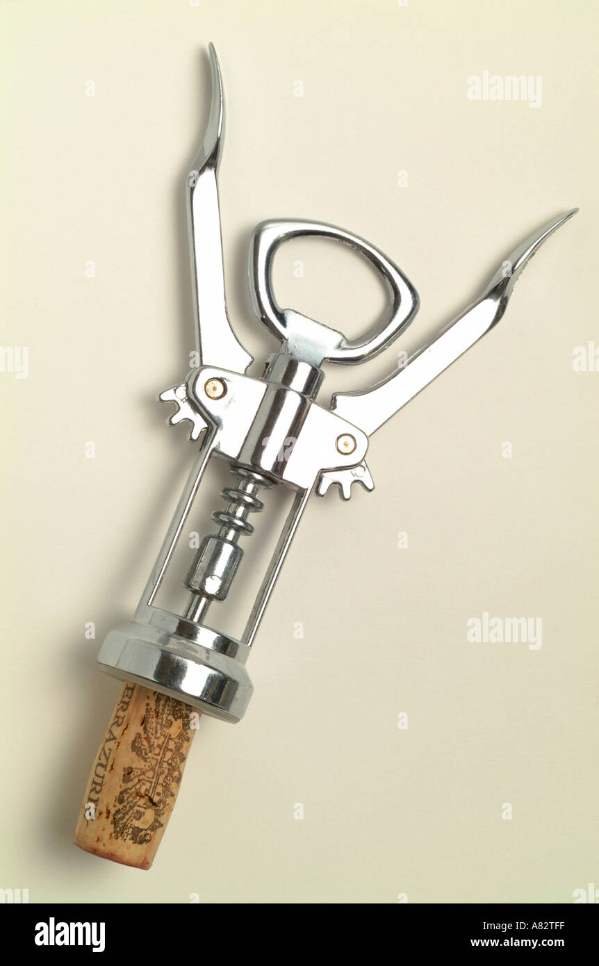 Cork screw worm gear waiters friend wine bottle opener metal white background Stock Photo Alamy