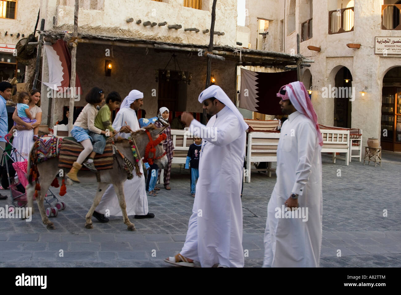 Qatar Doha Souk children on donkey Stock Photo