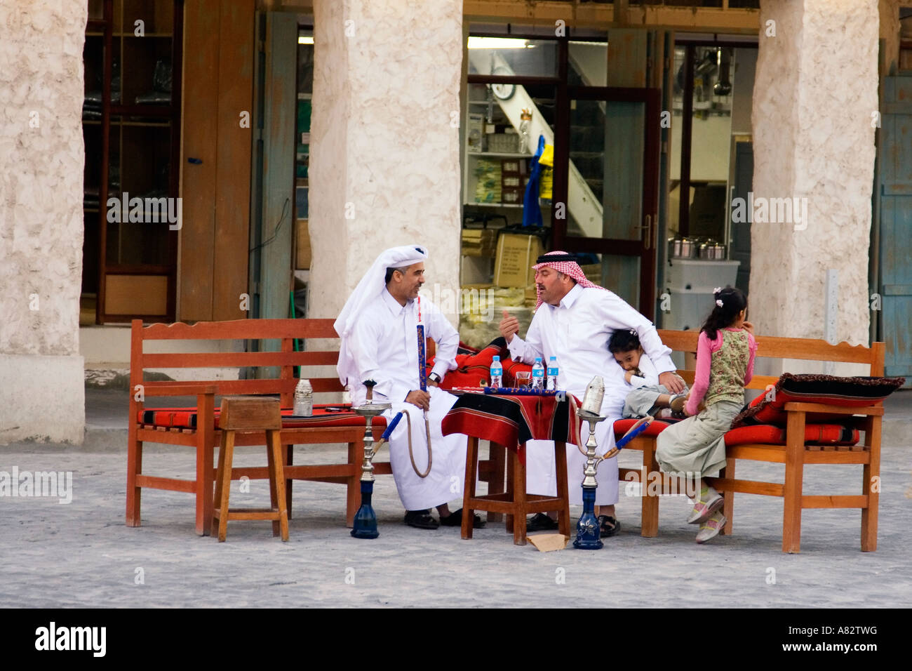 Qatar Doha Souk men smoking a sisha Stock Photo