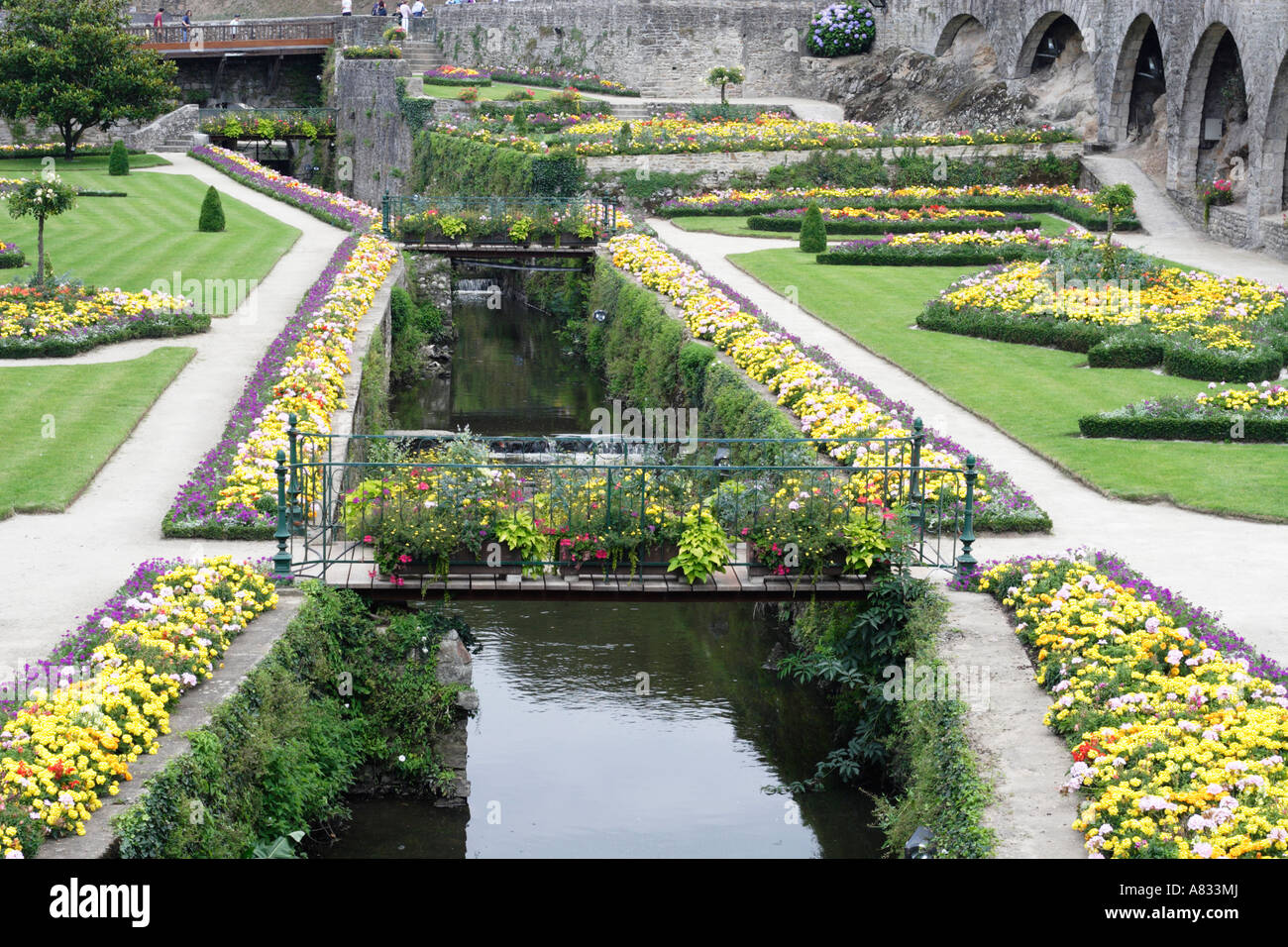 Flower garden, stream and bridges at Vannes, Brittany, France Stock