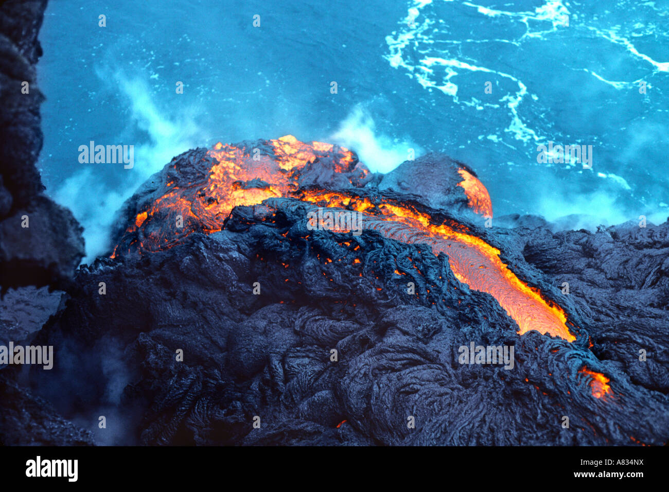 Lava flowing into the Pacific Ocean, Volcanos National Park, Hawaii