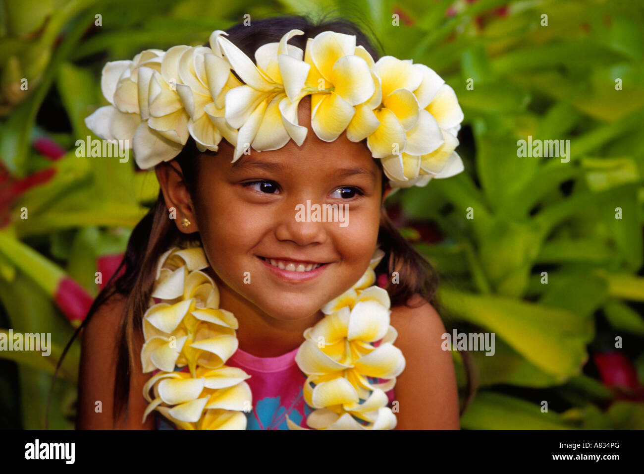 A young Hawaiian girl wearing a flower lei, Maui Hawaii Stock Photo Alamy