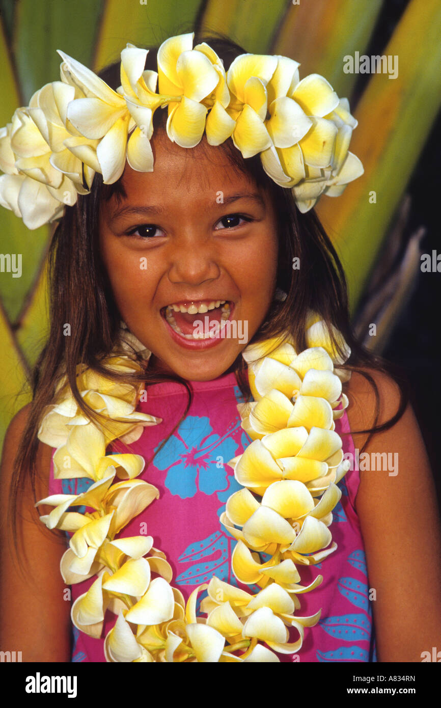 A young Hawaiian girl wearing a flower lei, Maui, Hawaii Stock Photo - Alamy
