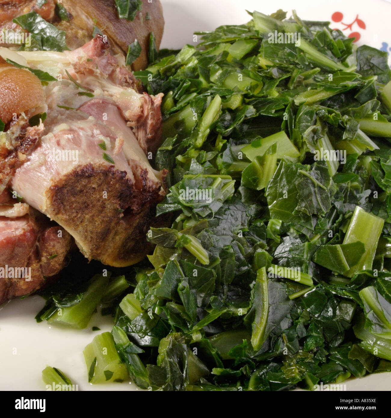 https://c8.alamy.com/comp/A835XE/ham-hock-with-collard-turnip-and-mustard-greens-A835XE.jpg