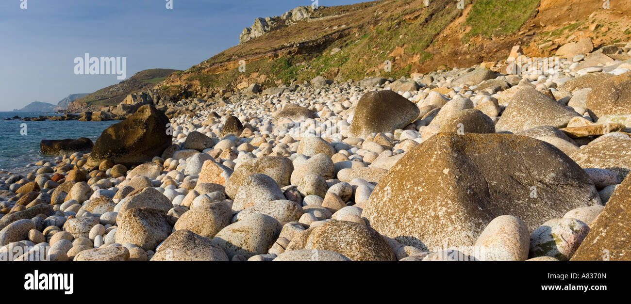 Panoramic image on a boulder beach near nanjulian Cove Cornwall. Stock Photo