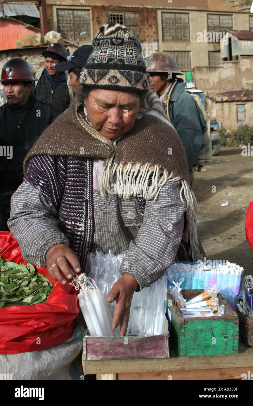 Alcohol & Coca Leaves vendor in Siglo XX, Potosi, Bolivia Stock Photo