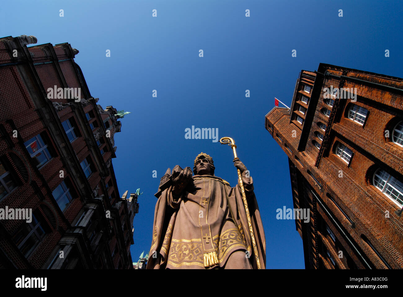 Statue of St. Ansgar on the Trostbrücke, on the right the building of