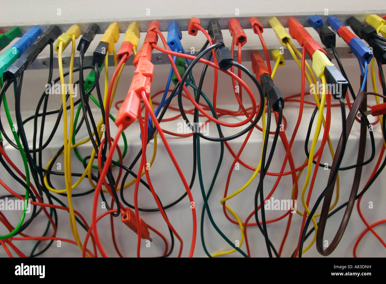 coloured electrical leads in physics laboratory in sixth 6th form