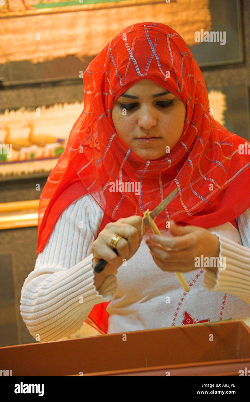 Egyptian Woman Demonstrating the Art of Paper Making at the Papyrus