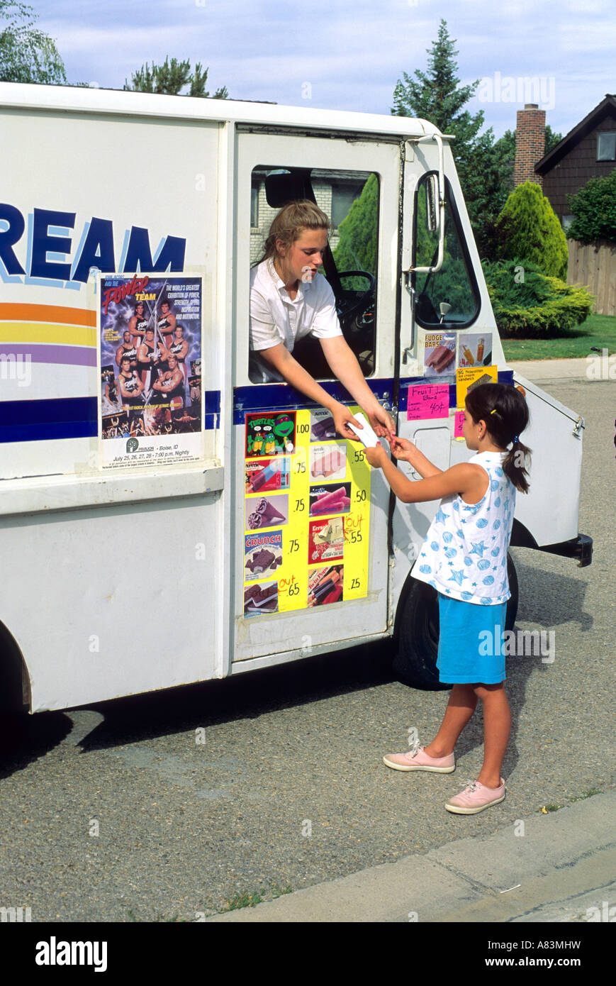 A child buying ice cream from an ice cream truck in Boise Idaho Stock Photo