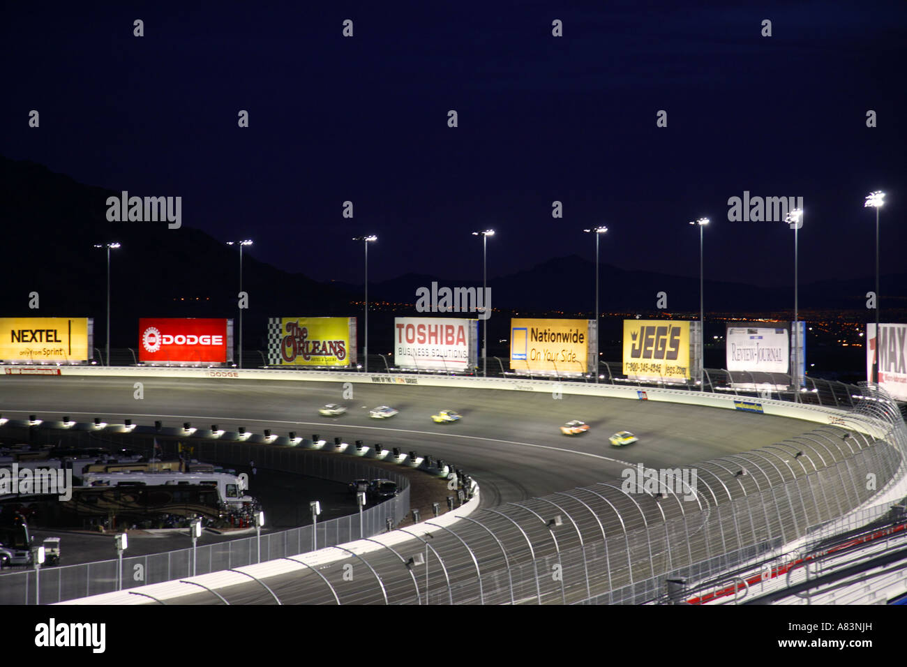 Car on the track at night at the Las Vegas Motor Speedway Las Vegas