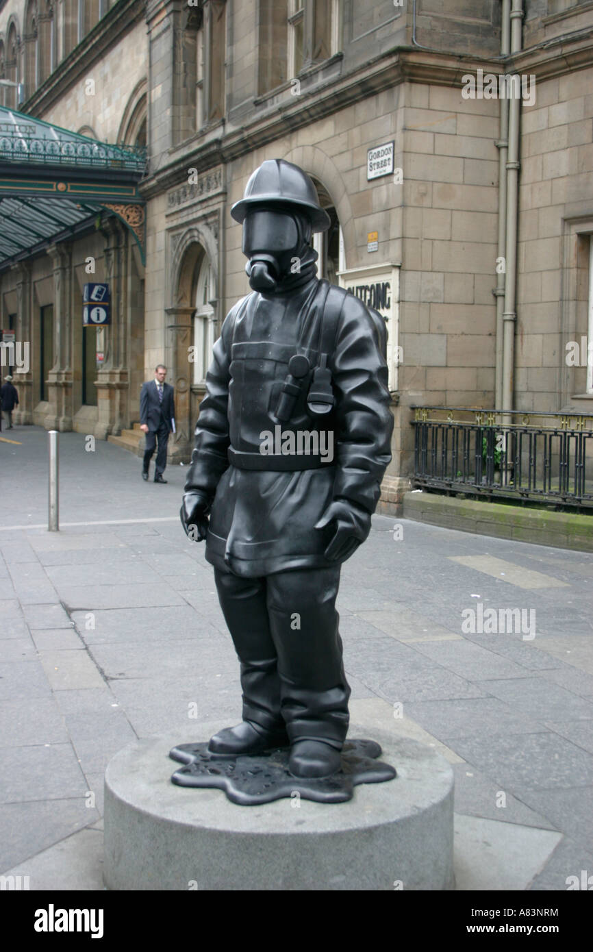 gas masked fireman glasgow city centre statue scotland Stock Photo