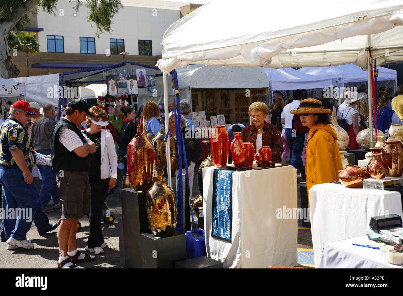 Visitors and vendor booths at the Fountain Hills Great Fair Fountain