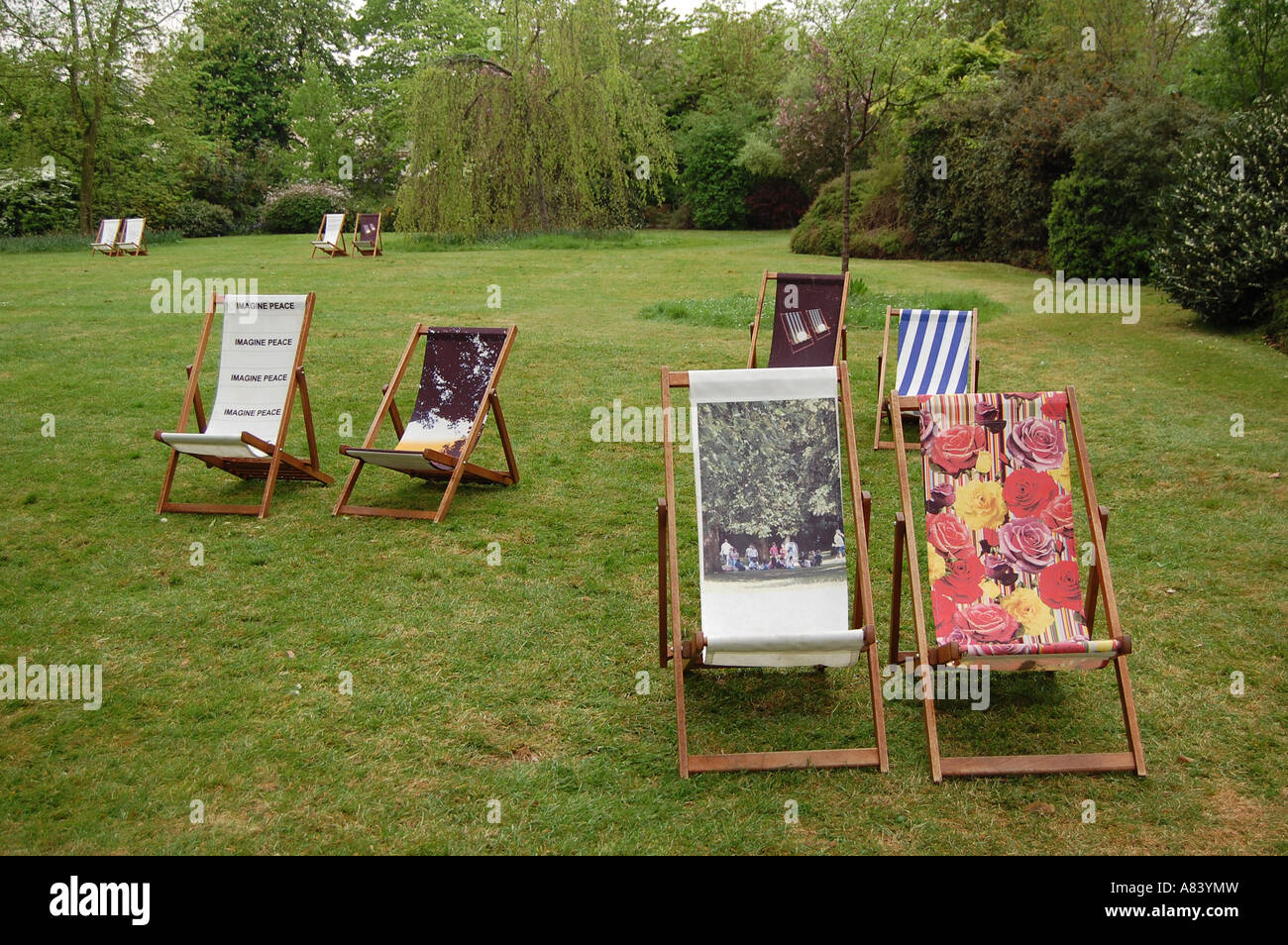 Deck chairs in the park Stock Photo - Alamy