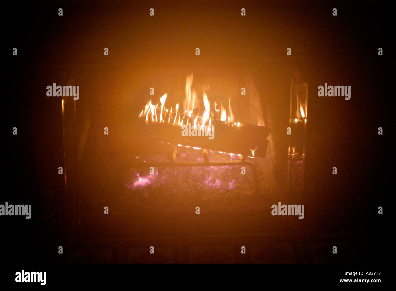 Cuddle by the fire hi-res stock photography and images - Alamy