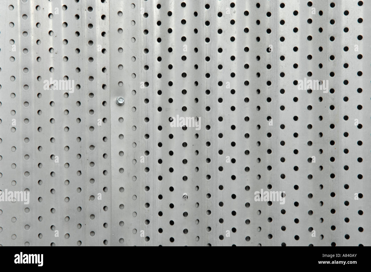 Metal Sheet with Pin Holes Stock Photo - Alamy