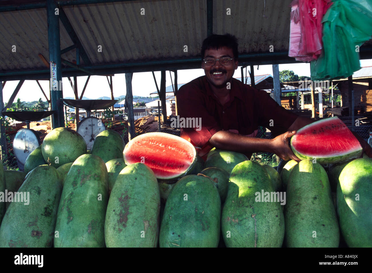 A Fijian man at his market stall, Fiji Stock Photo