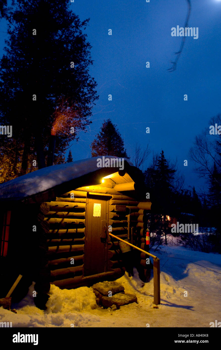 A log sauna heats up on a winter night Snowshoe Country Lodge Isabella